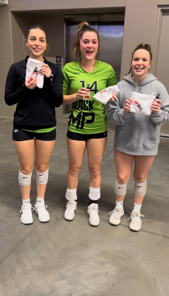 Volleyball players using Grip Spritz