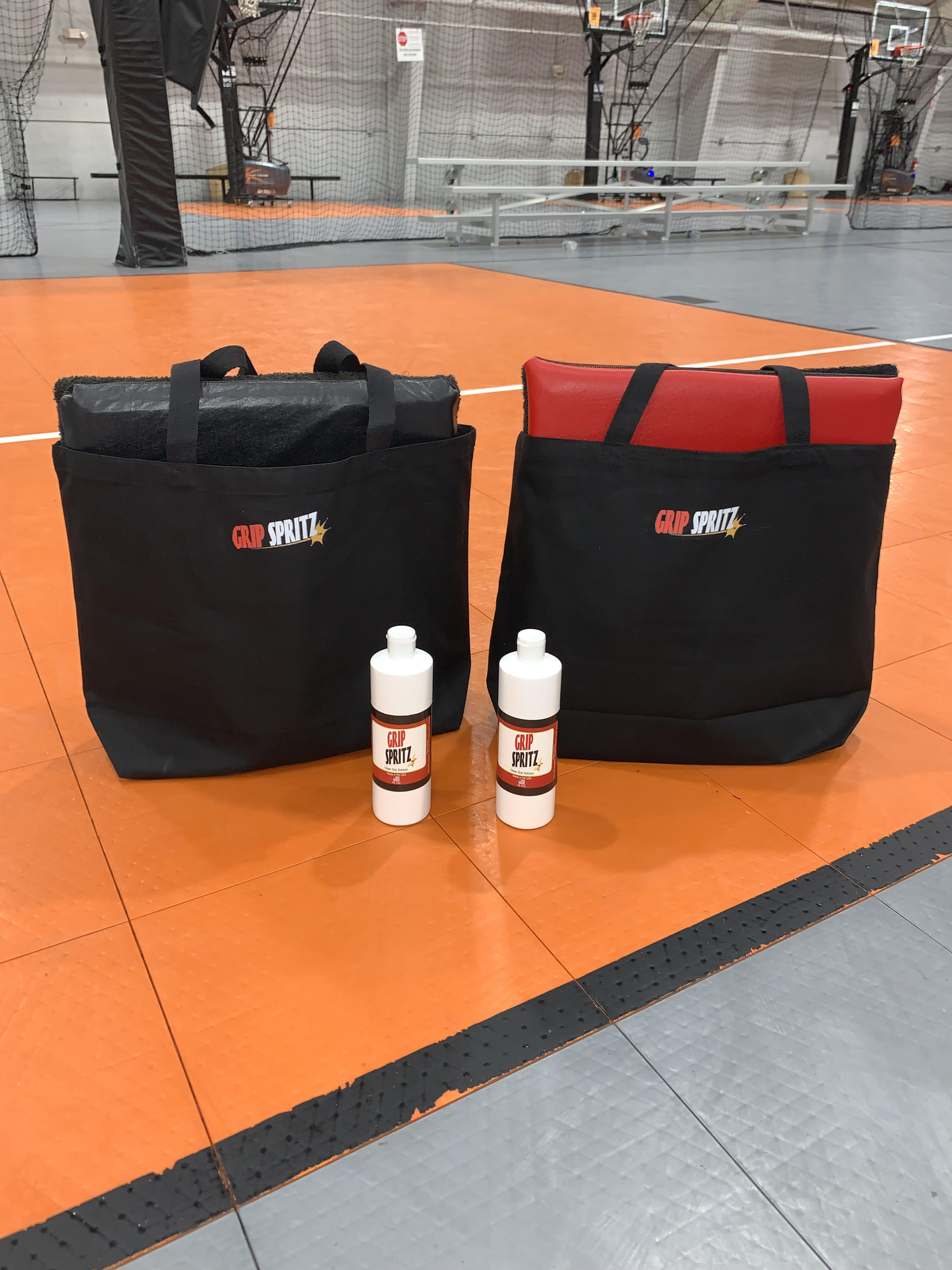 2 Grip Spritz Courtside Basketball Traction Mats in tote bags