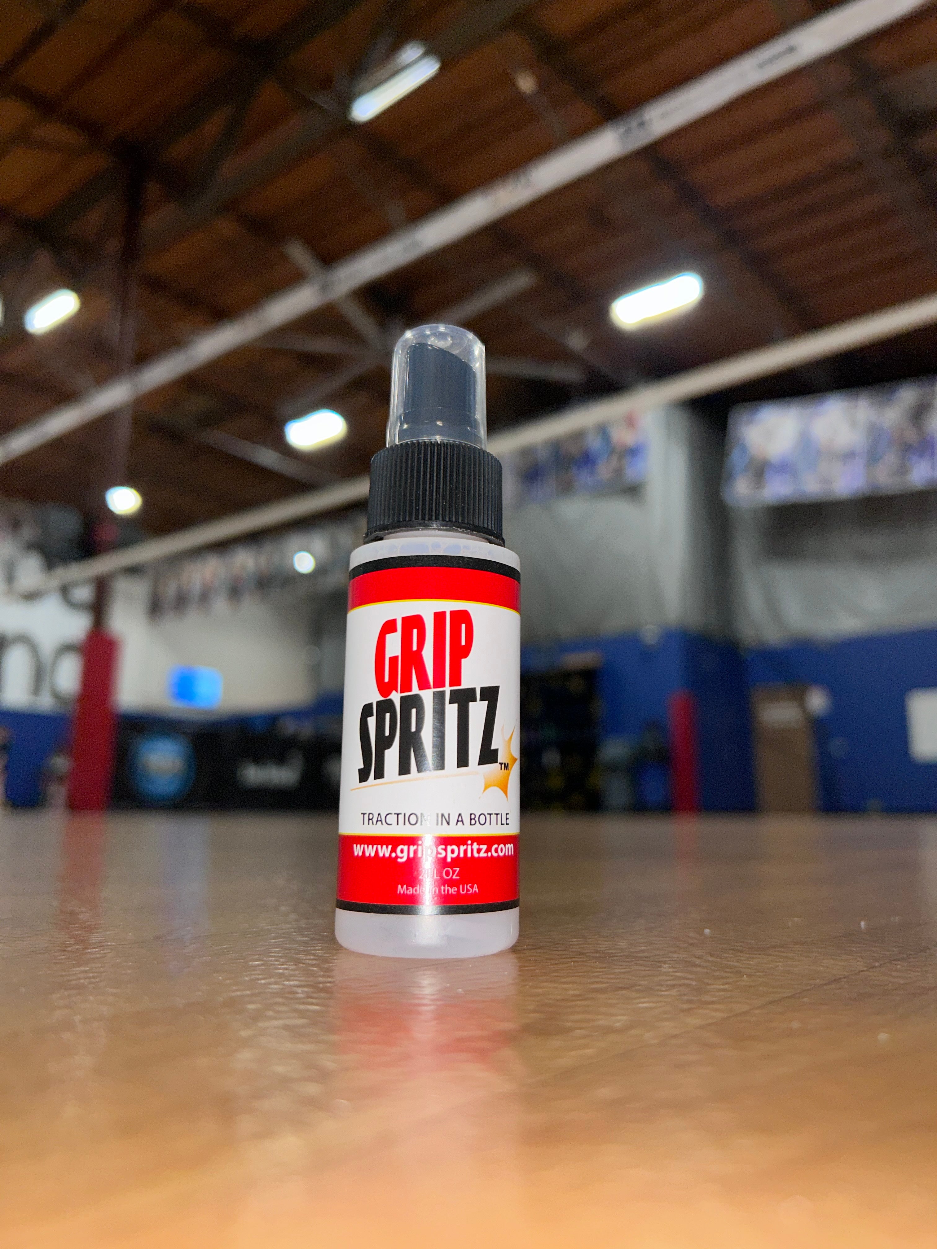 Grip Spritz volleyball shoe grip spray on a volleyball court
